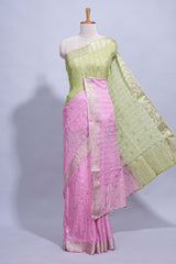 Green and pink double shaded zari checks georgette saree with small zari border and self pallu along with matching zari buttas blouse piece