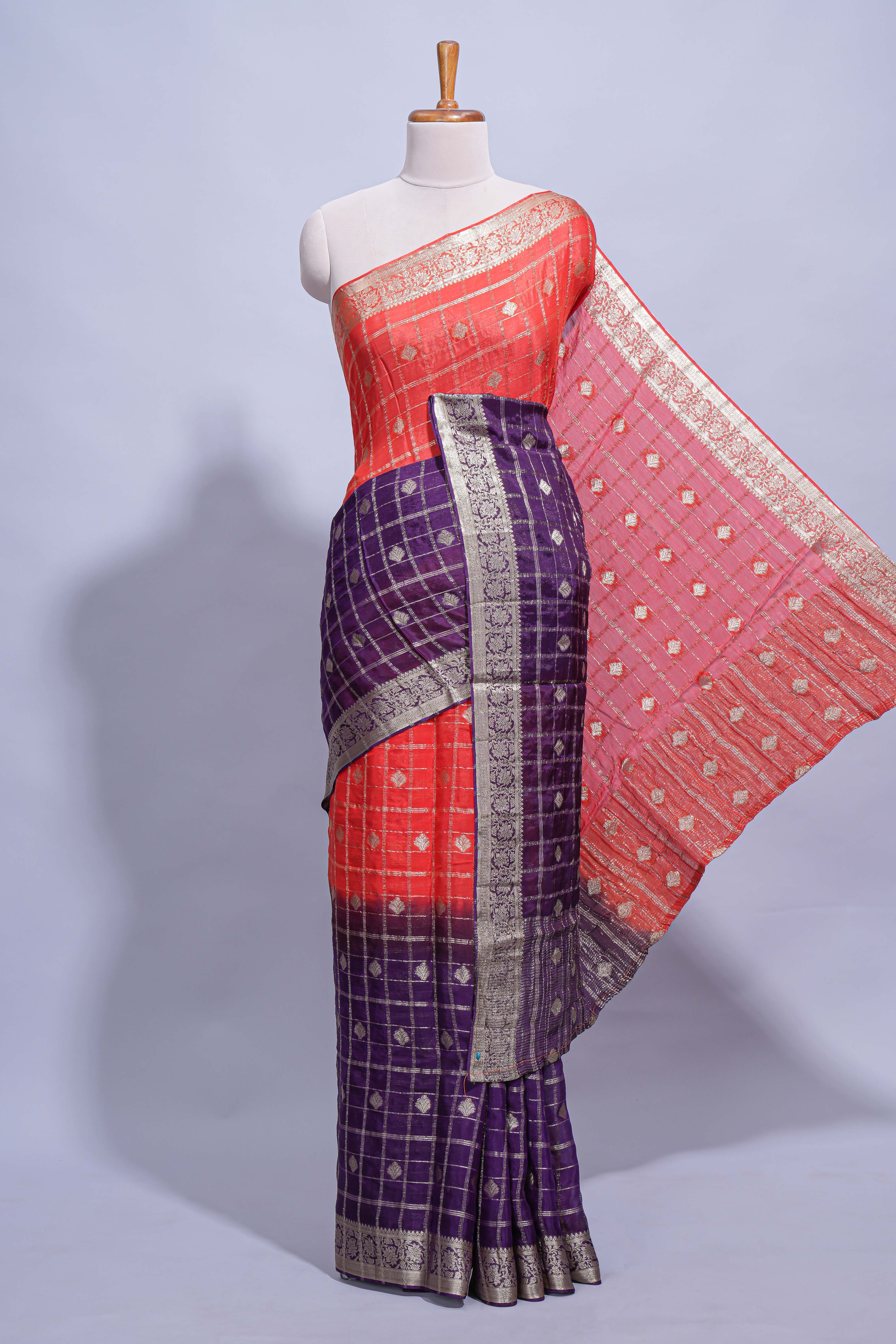 Red and violet double shaded zari checks georgette saree with small zari border and self pallu along with matching zari buttas blouse piece