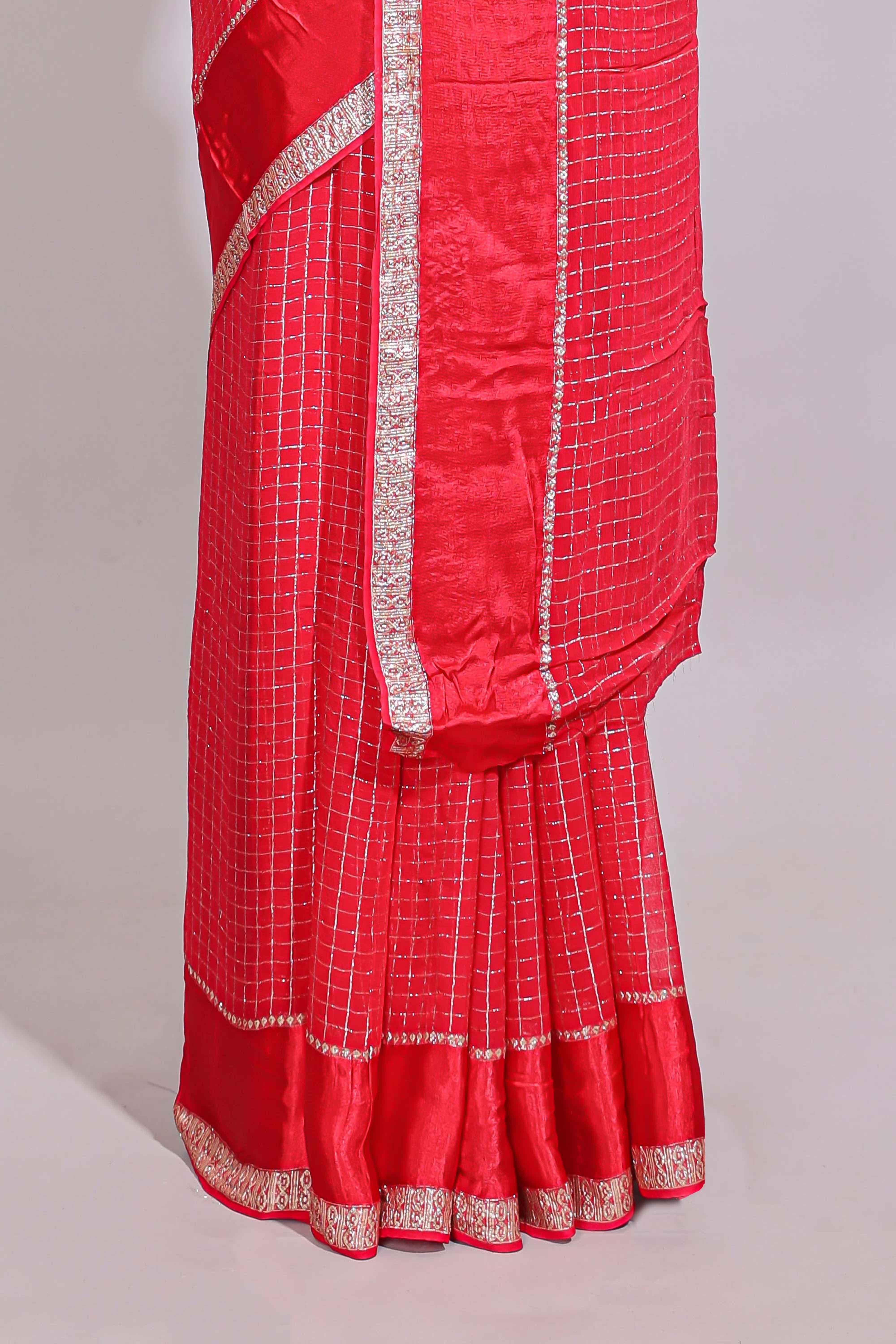 Red zari checks georgette saree with small zari border with self pallu and matching blouse