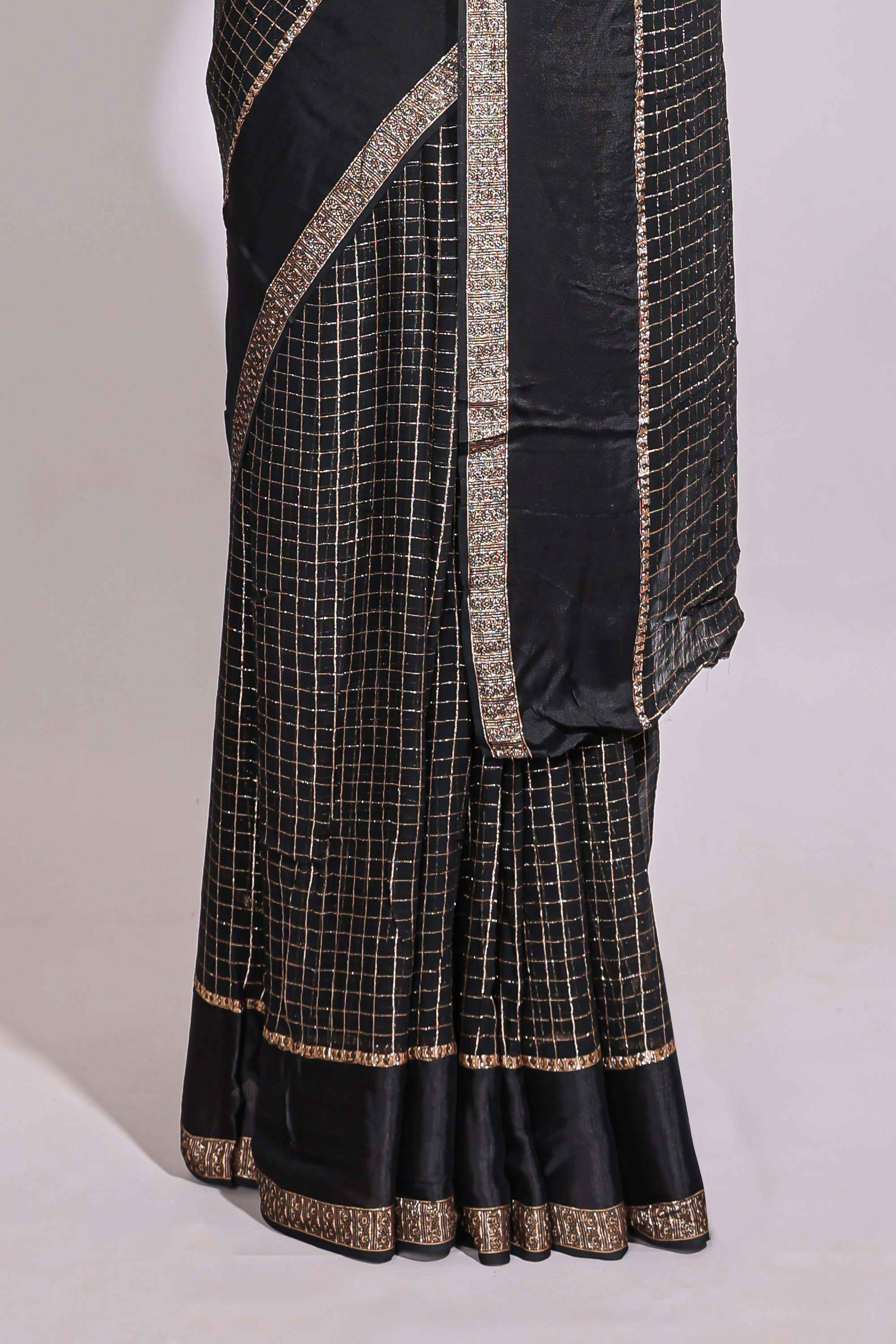 Black zari checks georgette saree with small zari border with self pallu and matching blouse