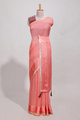 Peach zari checks georgette saree with small zari border and contrast aari work blouse