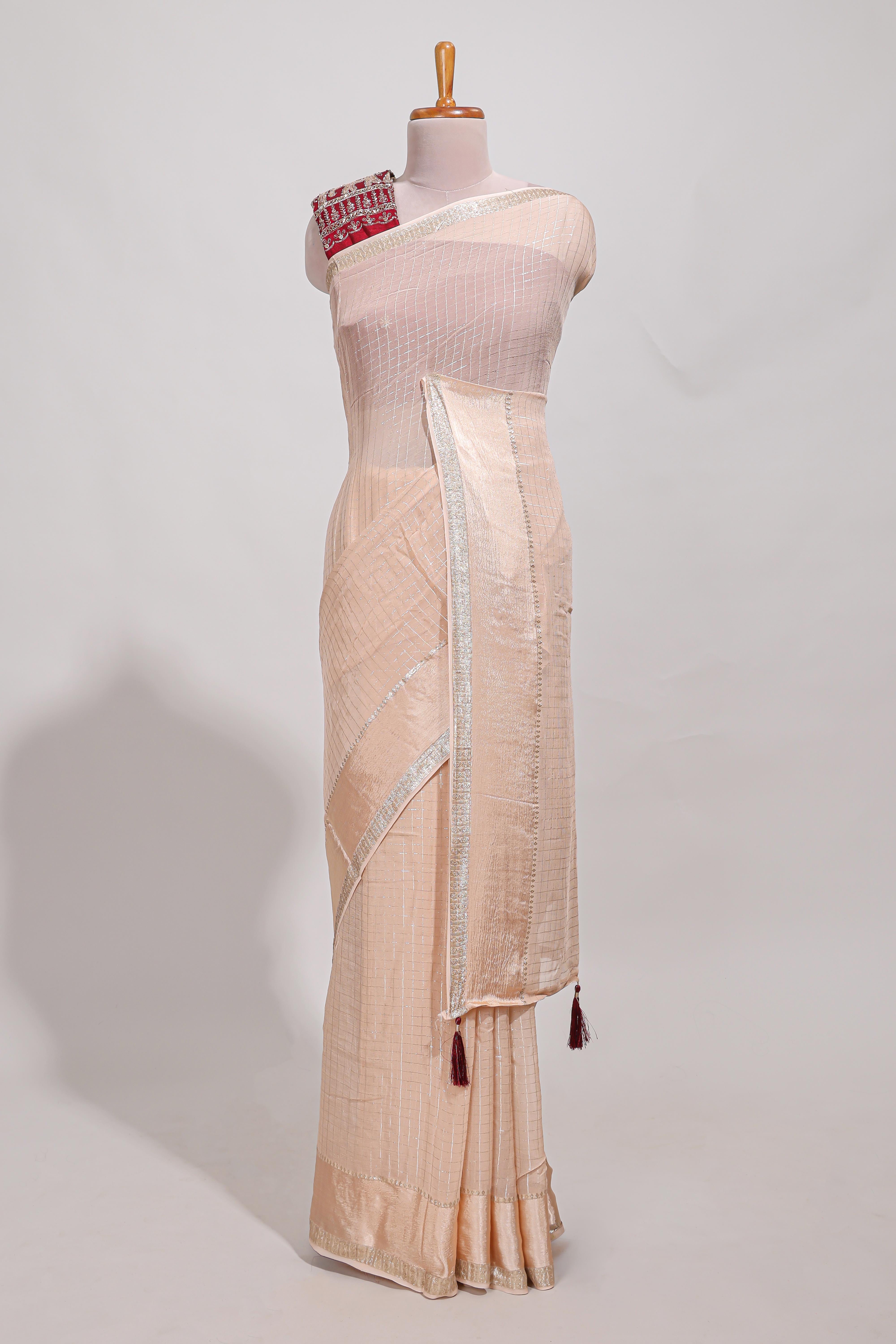 Cream zari checks georgette saree with small zari border and contrast aari work blouse