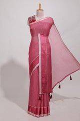 Magenta zari checks georgette saree with small zari border and contrast aari work blouse