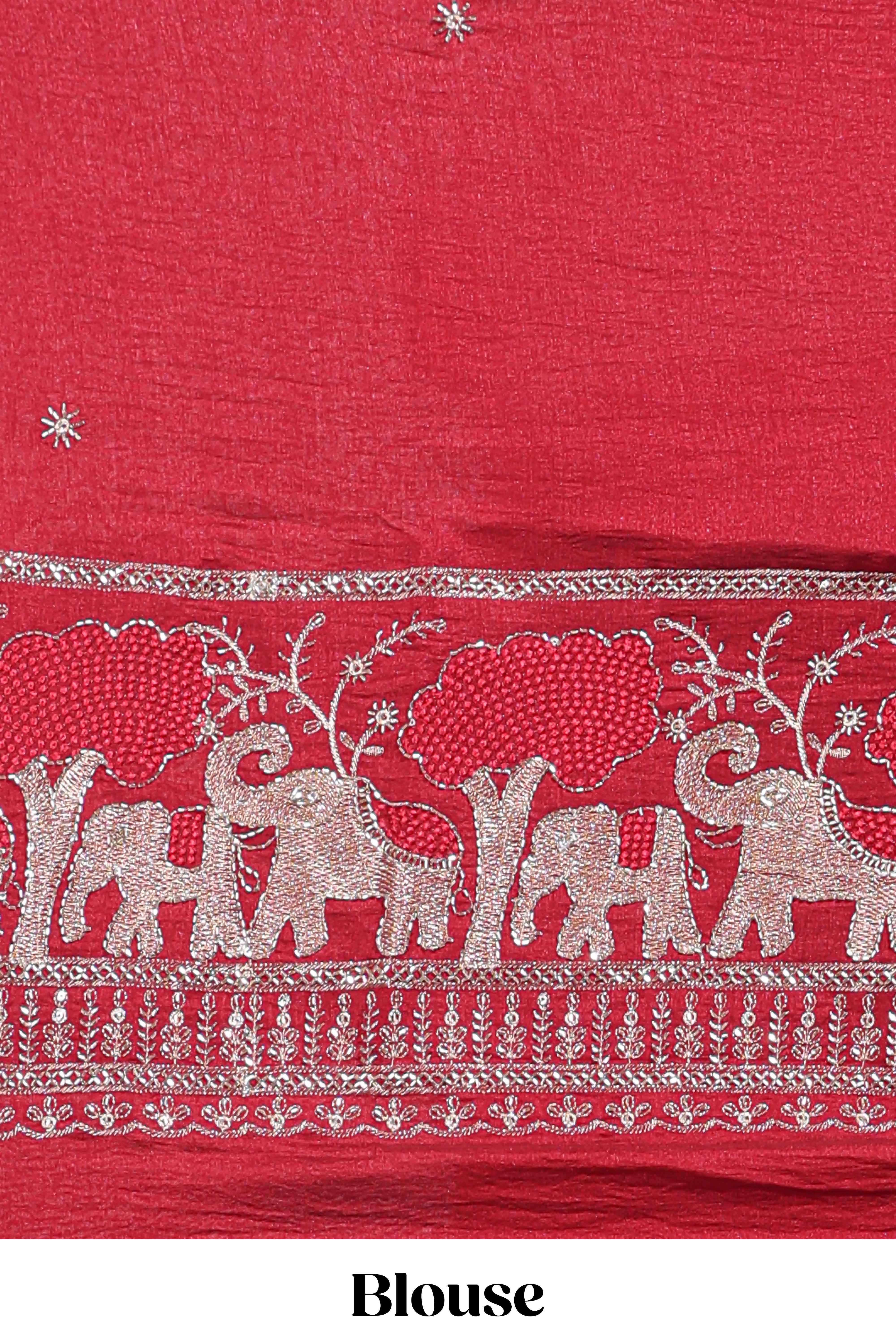 Magenta zari checks georgette saree with small zari border and contrast aari work blouse