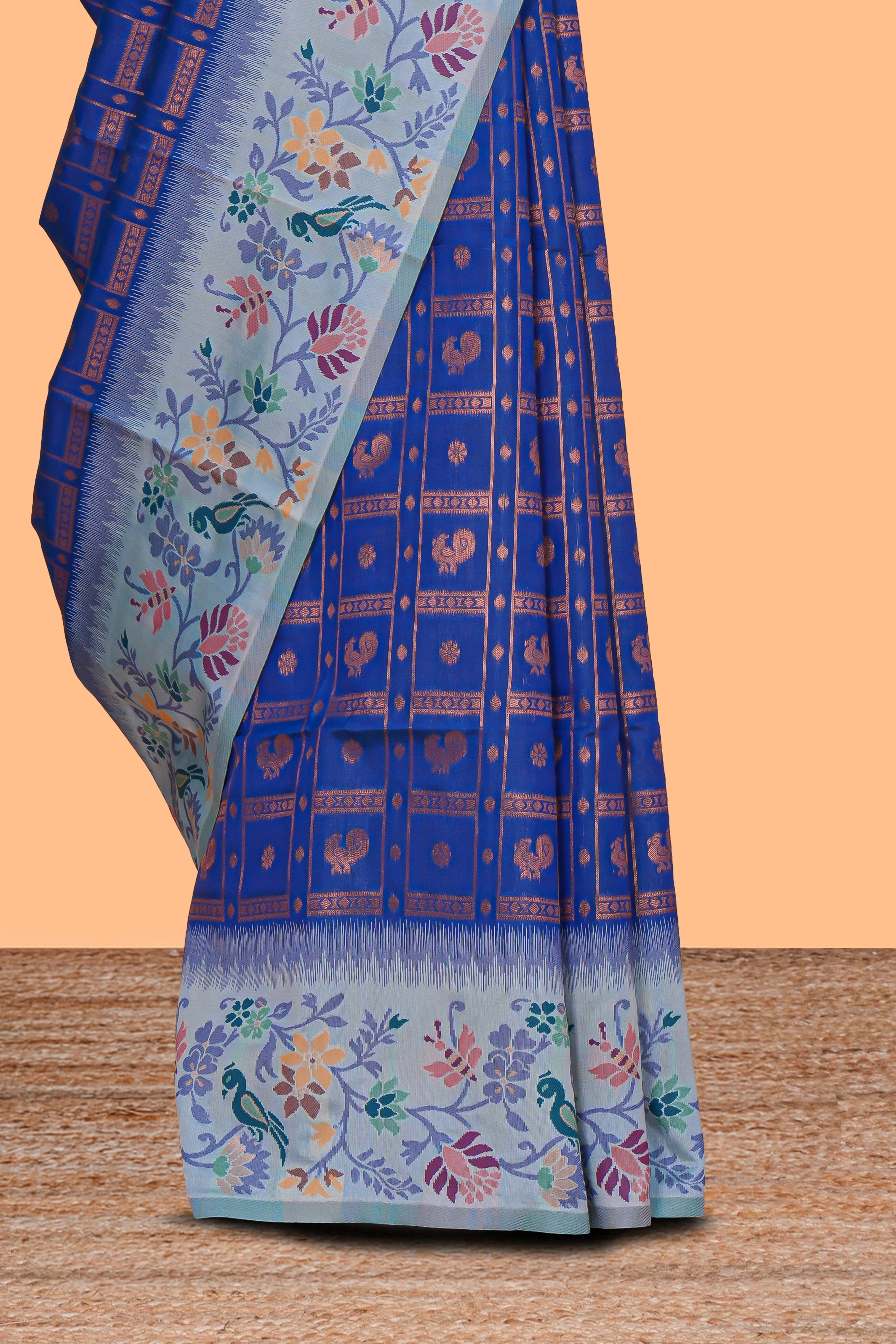 Blue geometric zari motifs ikkat cotton saree with contrast floral & birds design border and zari motifs blouse