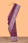 Wine color geometric zari motifs ikkat cotton saree with contrast floral & birds design border and zari motifs blouse
