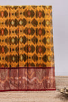 Mustard ikkat style motifs design ikkat cotton saree with contrast zari design border and plain blouse