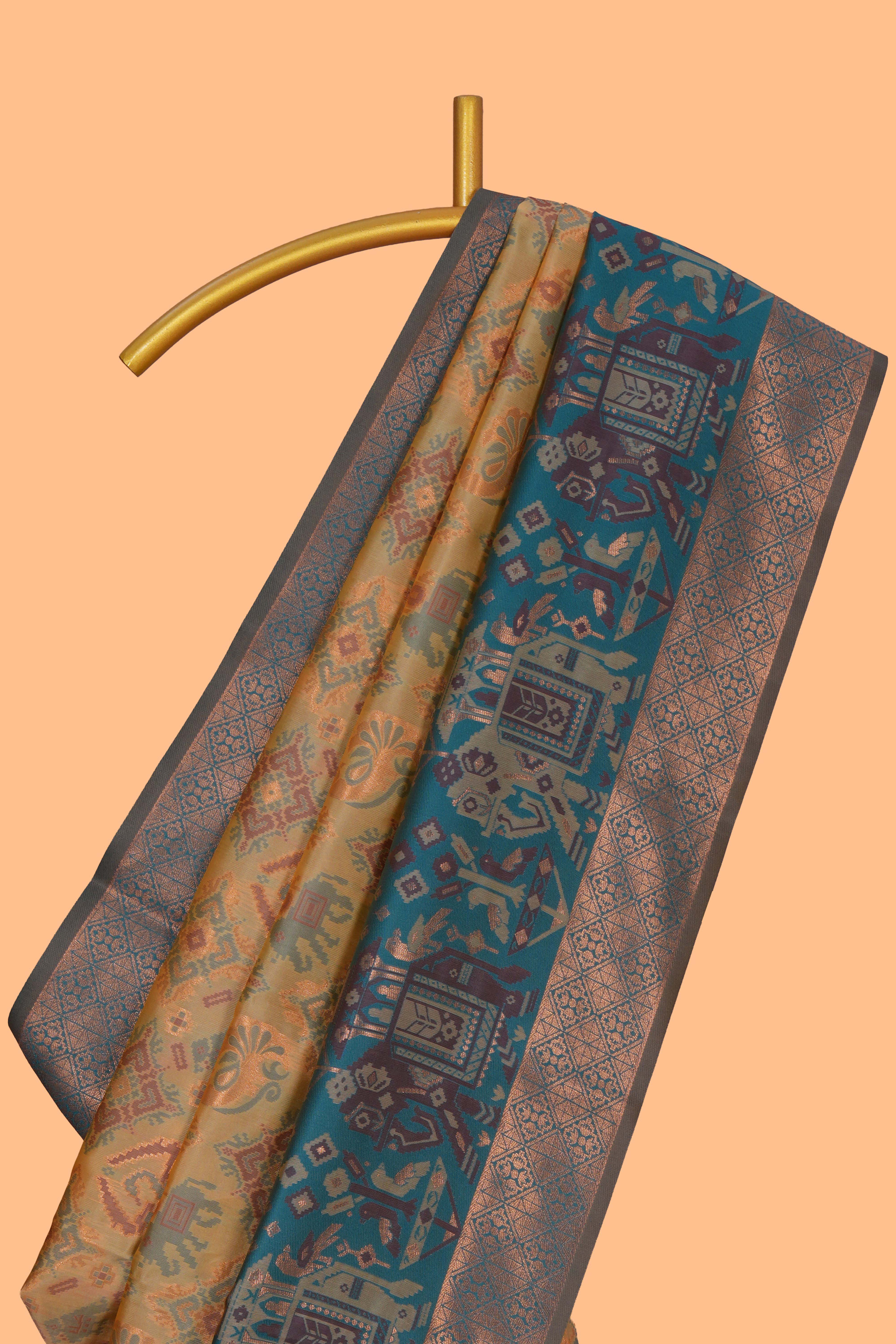 Mustard geometric & elephant motifs design ikkat cotton saree with contrast elephant design border and zari motifs blouse