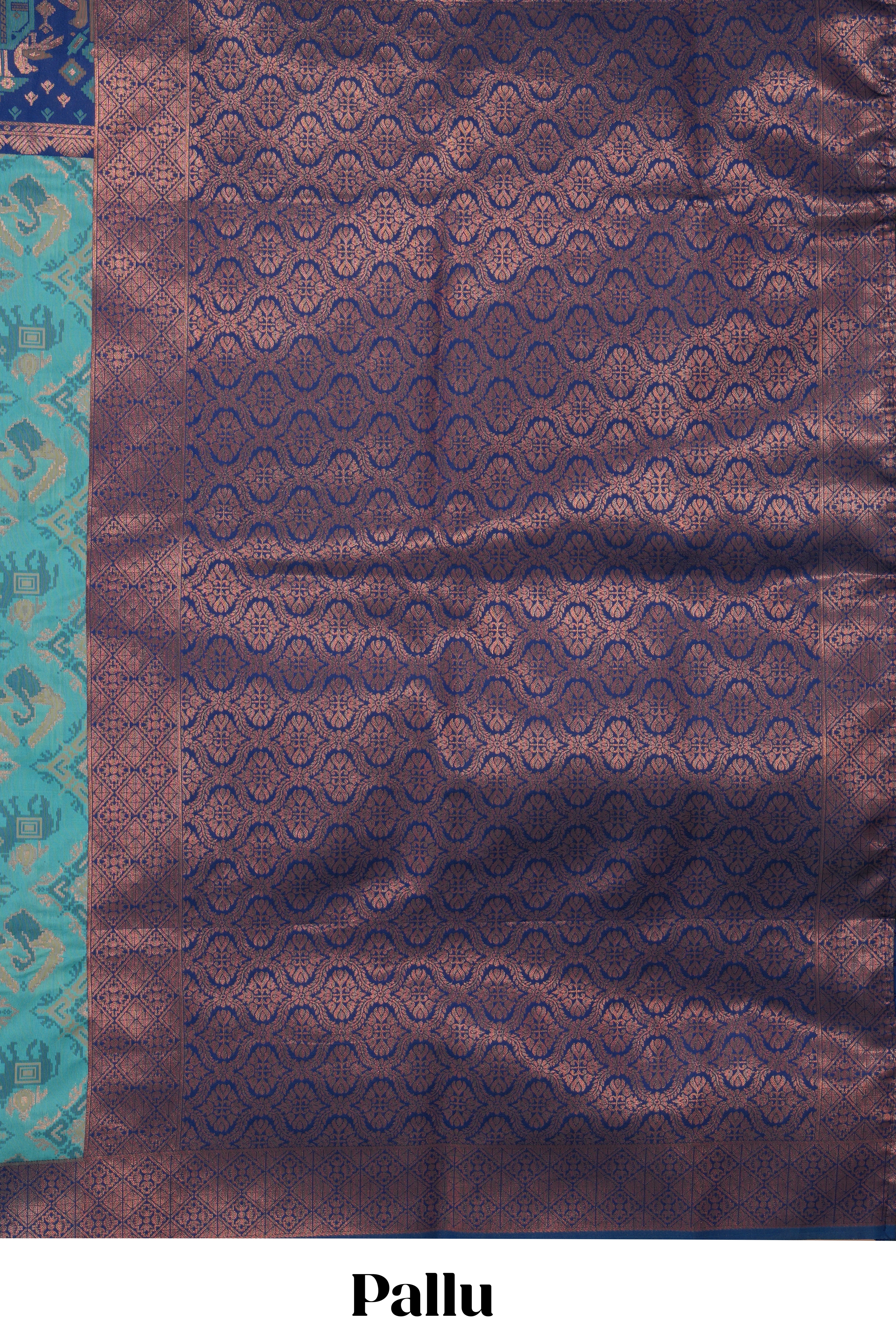 Teal green geometric & elephant motifs design ikkat cotton saree with contrast elephant design border and zari motifs blouse