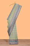 Green geometric motifs design ikkat cotton saree with contrast zari design border and zari floral motifs blouse