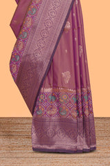 Plum lavender zari motifs design ikkat cotton saree with contrast zari design border and zari floral motifs blouse