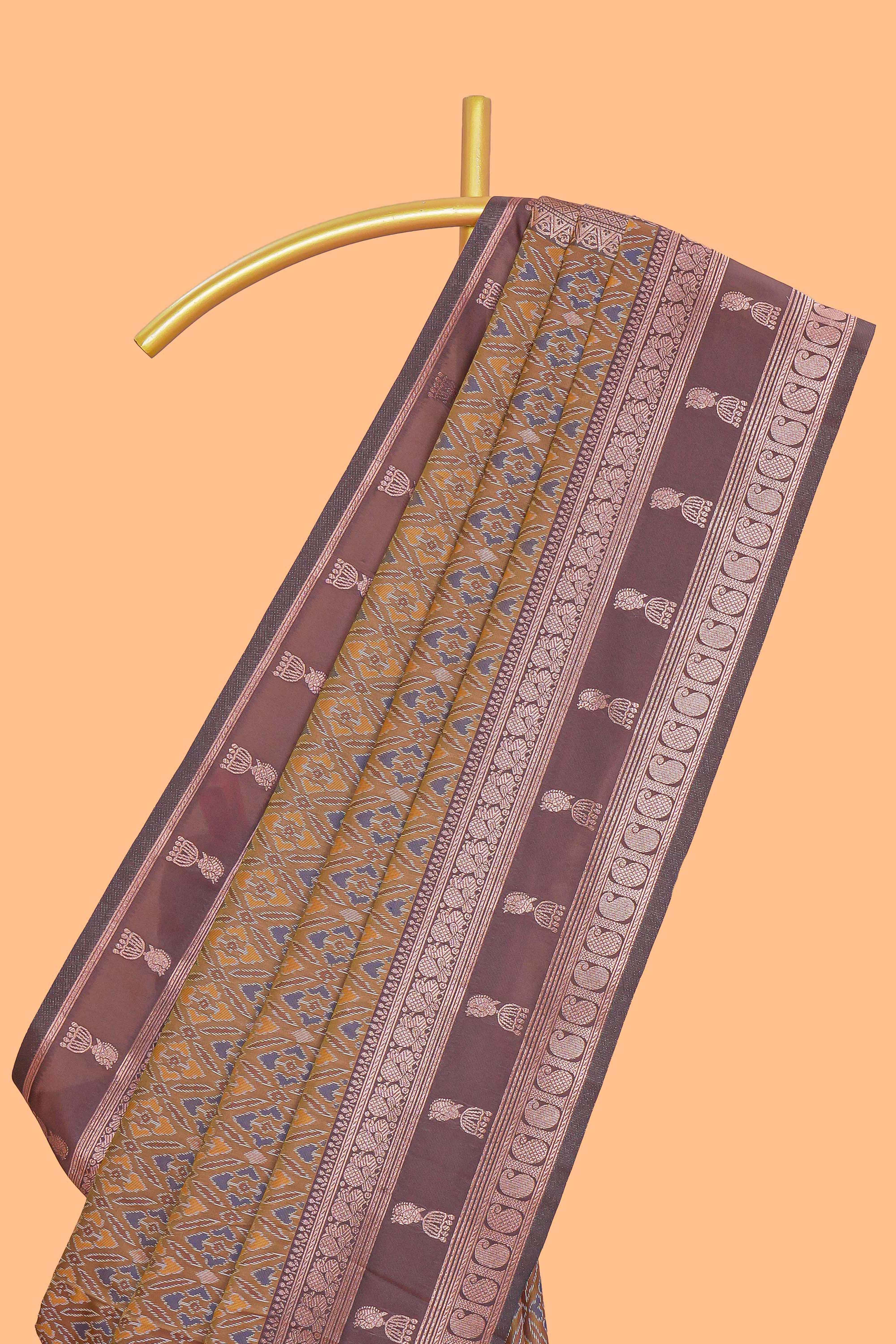 Mustard floral design ikkat cotton saree with contrast zari design border and zari floral motifs blouse