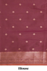 Orange floral design ikkat cotton saree with contrast zari design border and zari floral motifs blouse