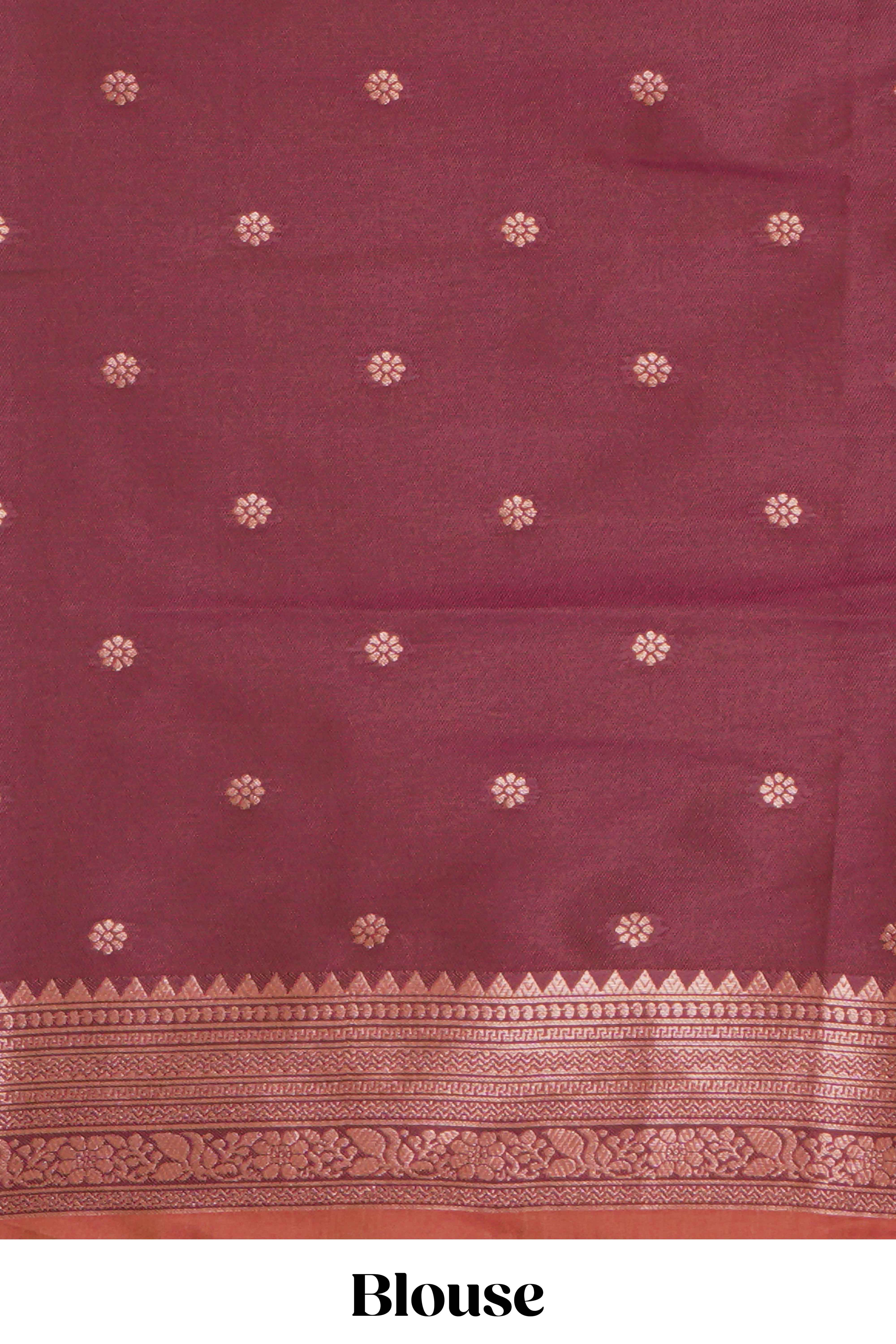 Orange floral design ikkat cotton saree with contrast zari design border and zari floral motifs blouse