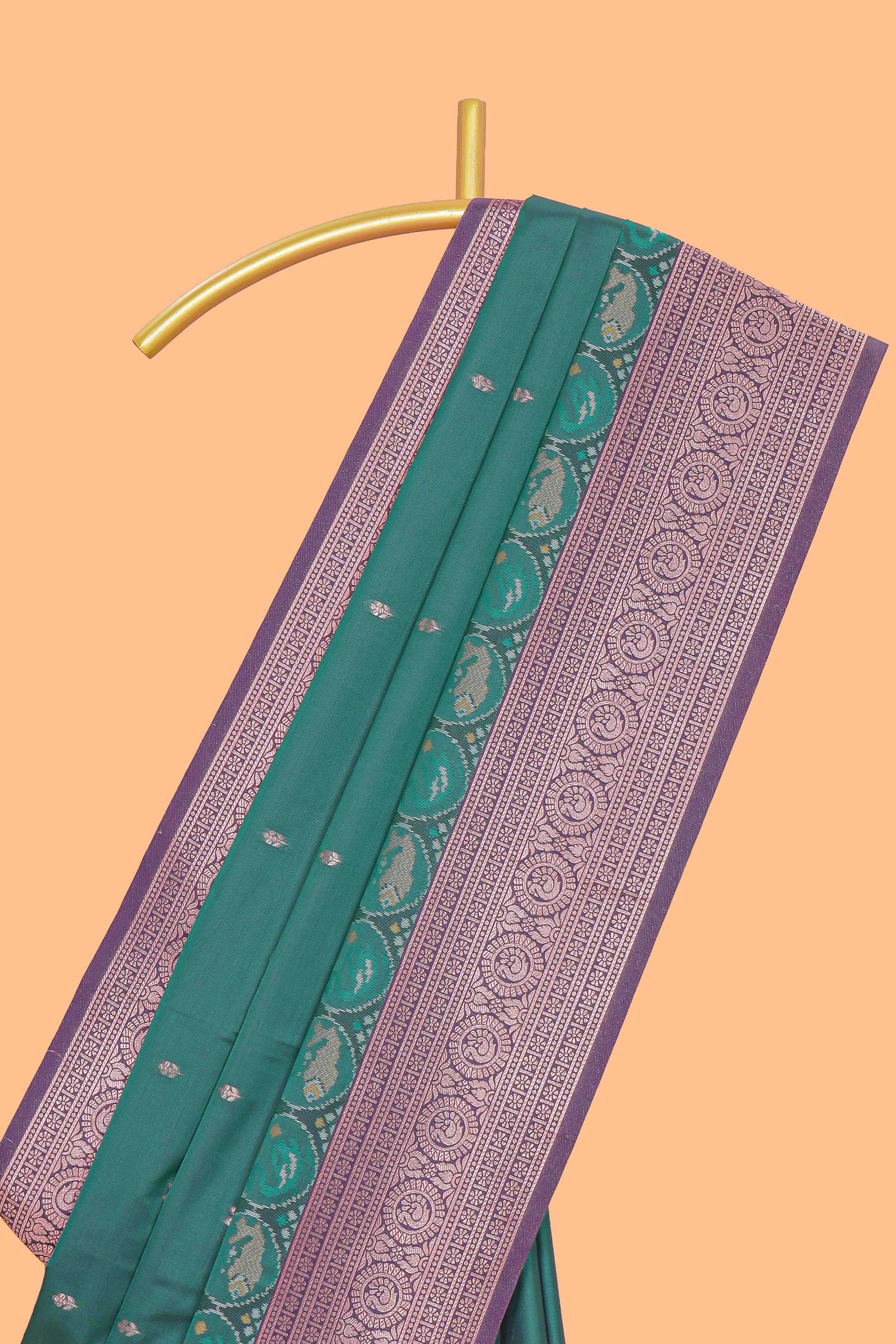 Green floral design zari motifs ikkat cotton saree with contrast zari design border and zari floral motifs blouse