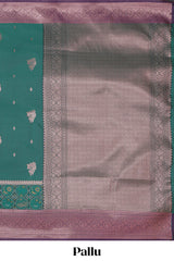 Green floral design zari motifs ikkat cotton saree with contrast zari design border and zari floral motifs blouse