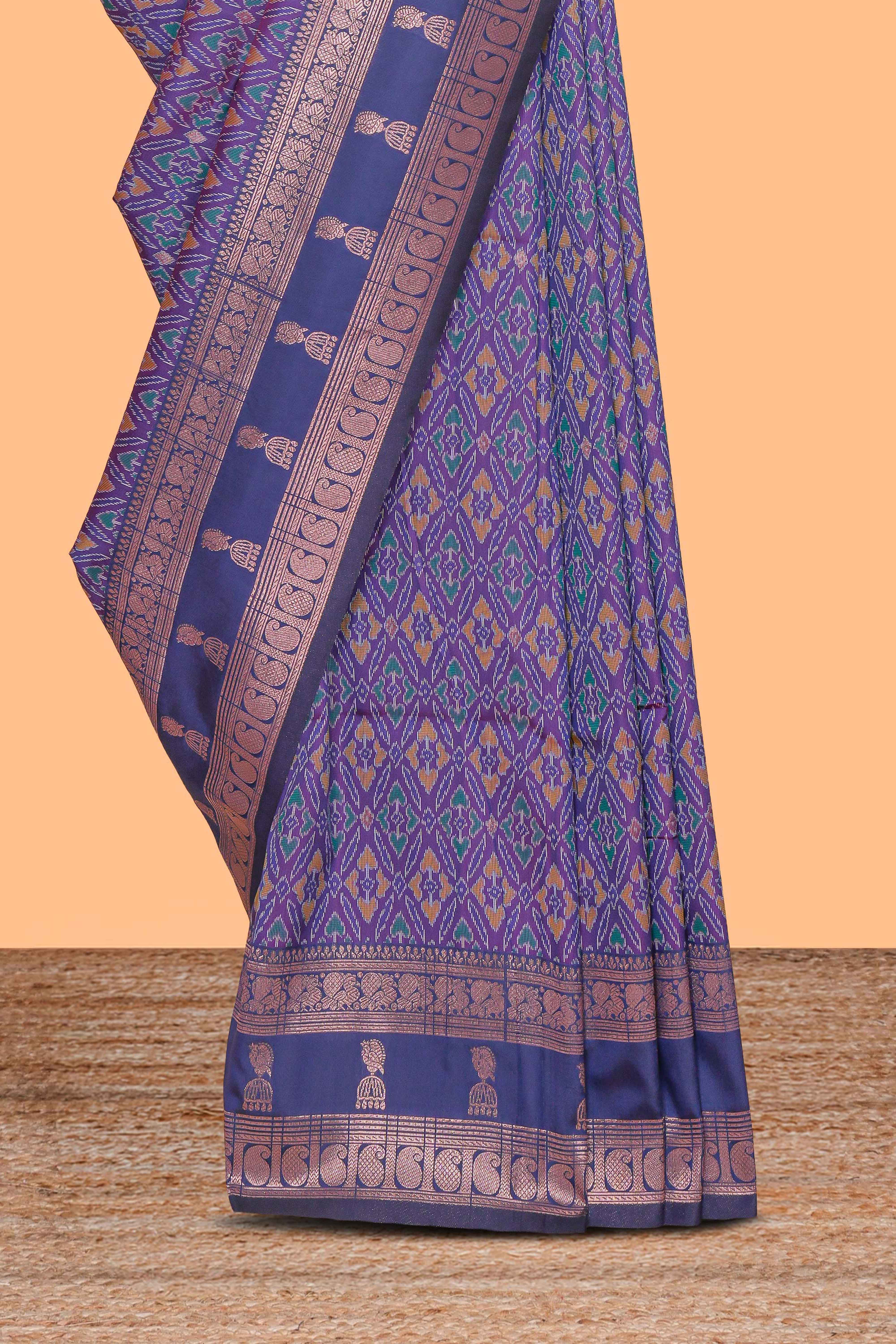 Lavender floral design zari motifs ikkat cotton saree with contrast zari design border and zari floral motifs blouse