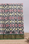 Grey ikkat style motifs design ikkat cotton saree with contrast zari design border and plain blouse