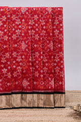 Red ikkat style motifs design ikkat cotton saree with contrast zari design border and plain blouse