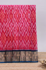Pink ikkat style motifs design ikkat cotton saree with contrast zari design border and plain blouse