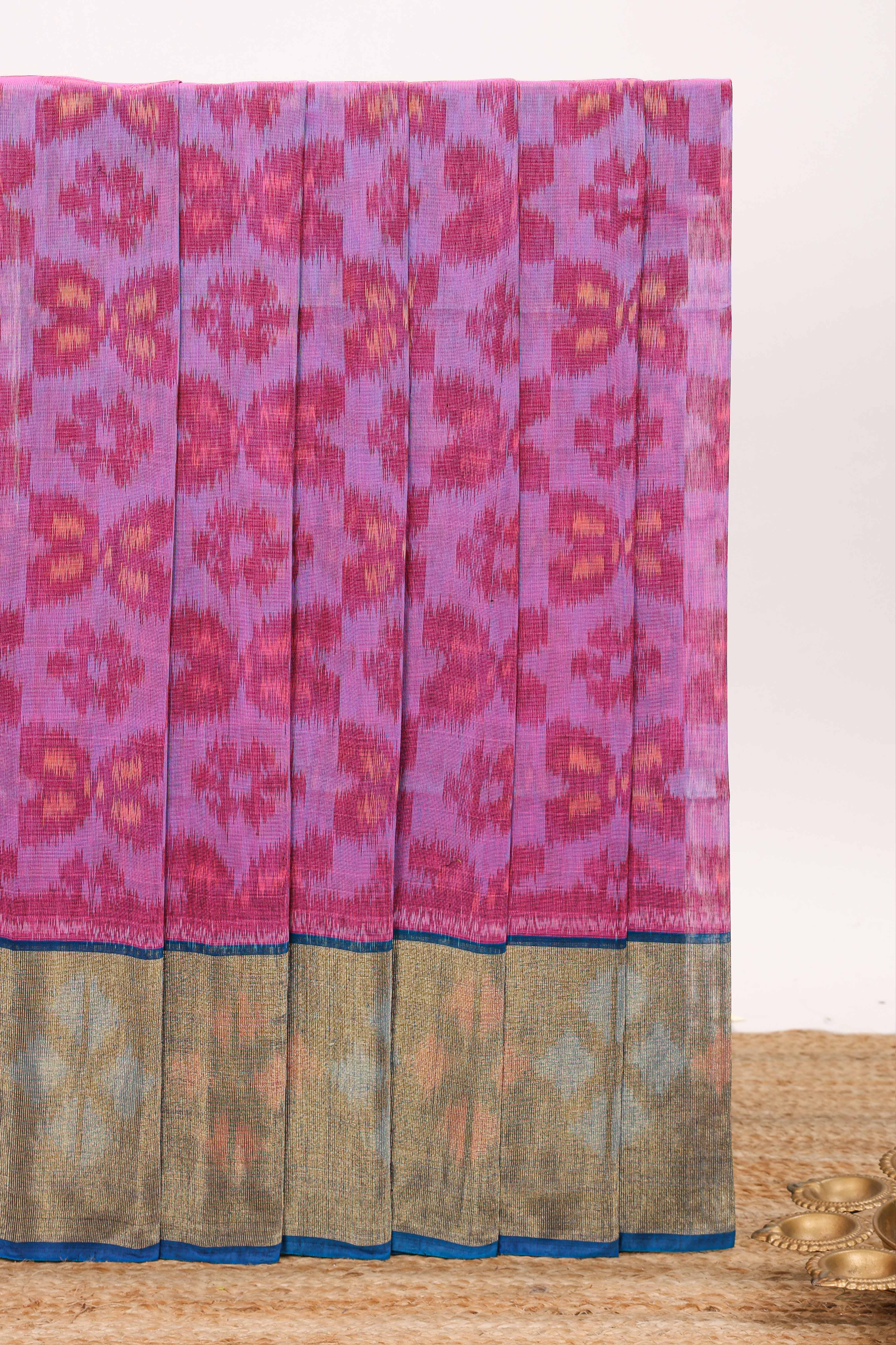 Lavender motifs design ikkat cotton saree with contrast border and blouse