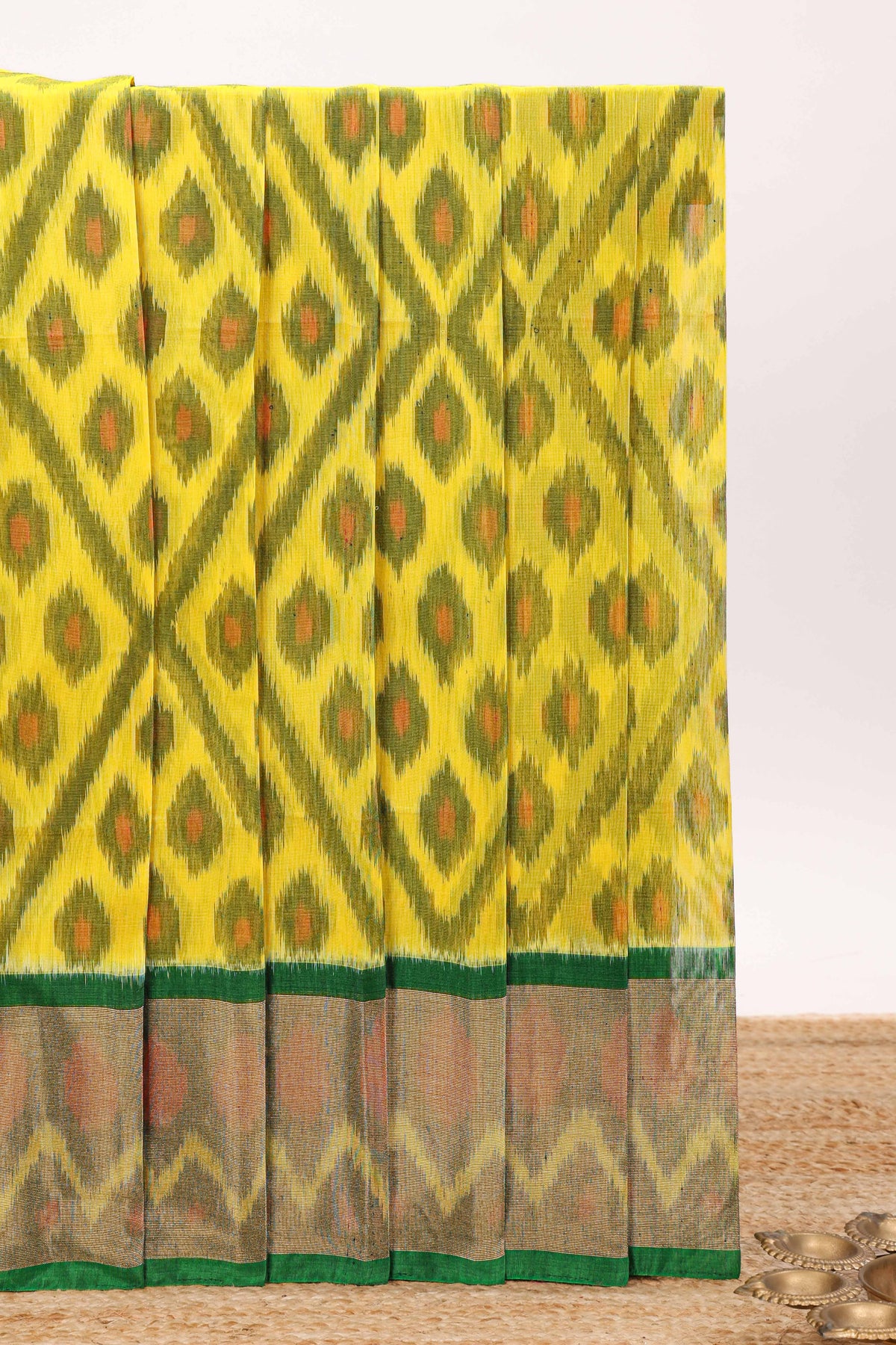 Yellow gemetric designed ikkat cotton saree with contrast border and blouse