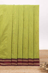 Green butta designed kalyani cotton saree with contrast border and zari designed pallu with plain blouse