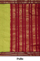Green butta designed kalyani cotton saree with contrast border and zari designed pallu with plain blouse
