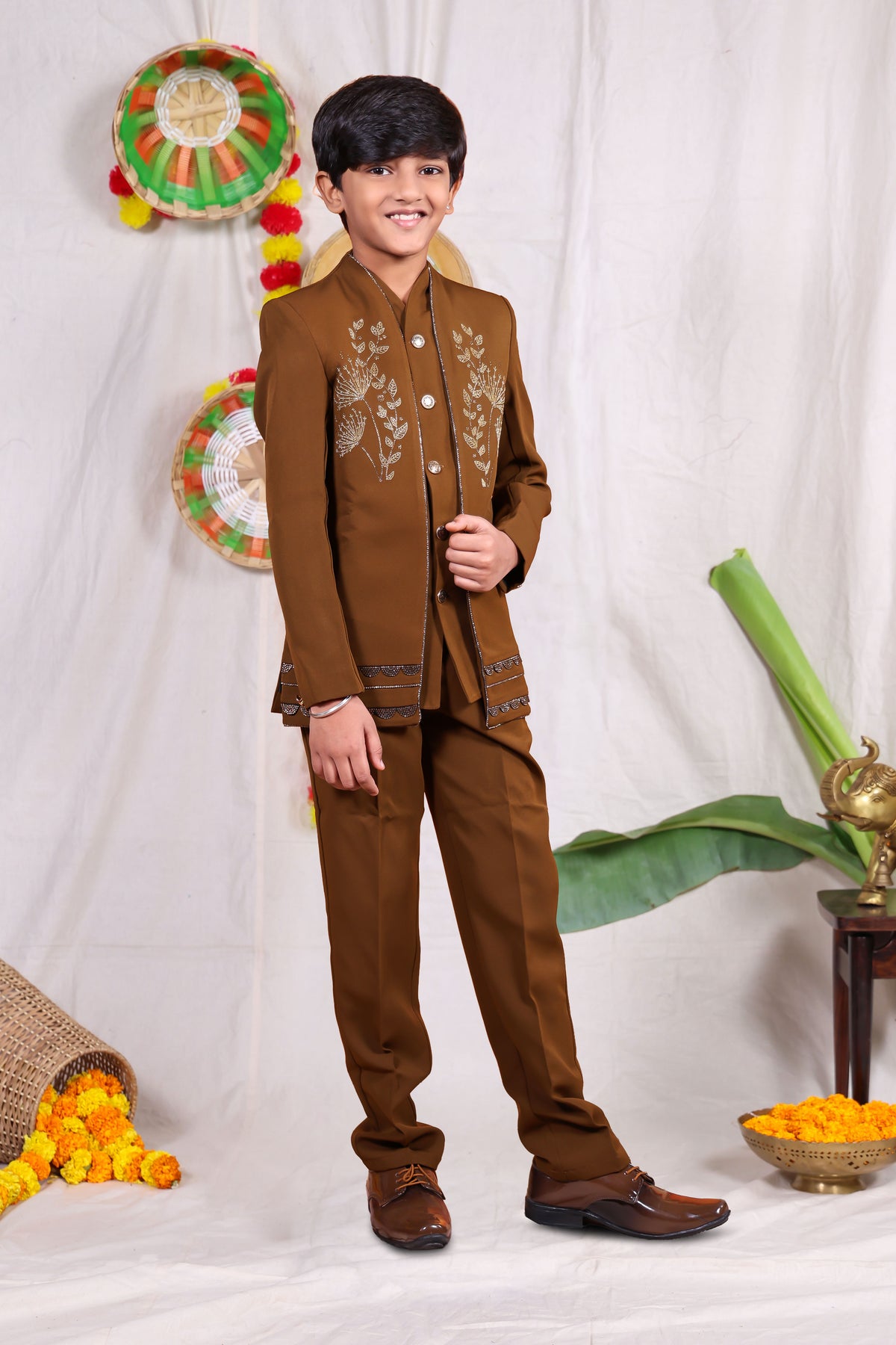 Brown boys suit set with gold piping and flower design