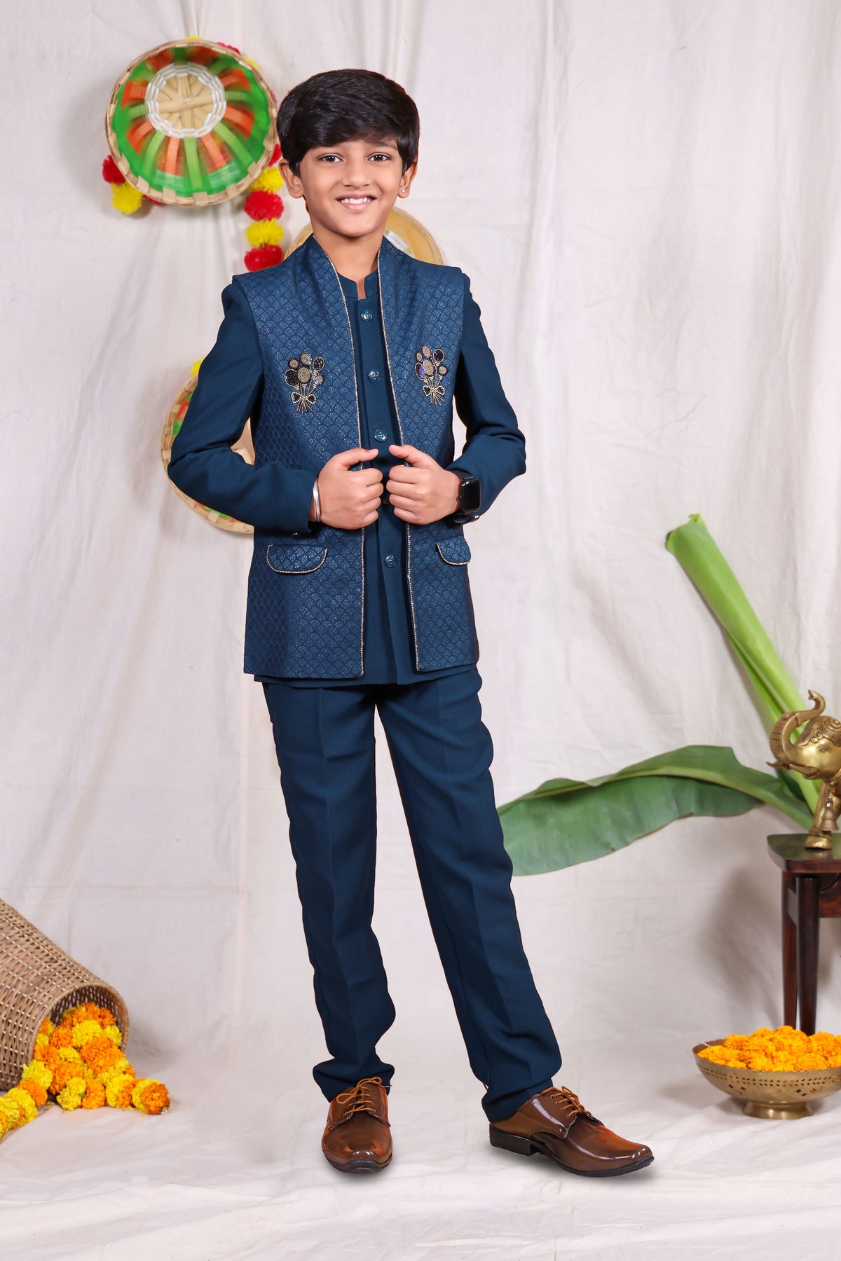 Blue boys suit set with gold piping and flower design