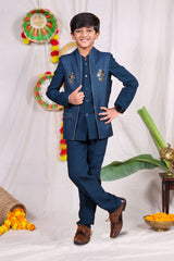 Blue boys suit set with gold piping and flower design