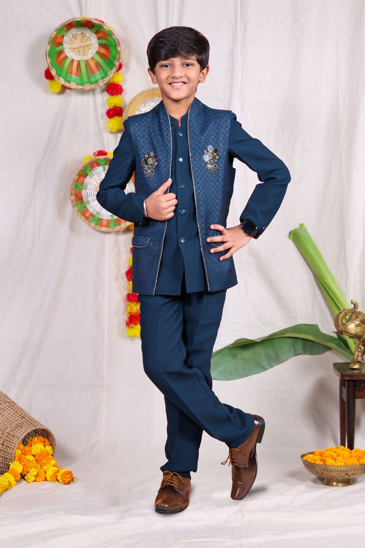 Blue boys suit set with gold piping and flower design
