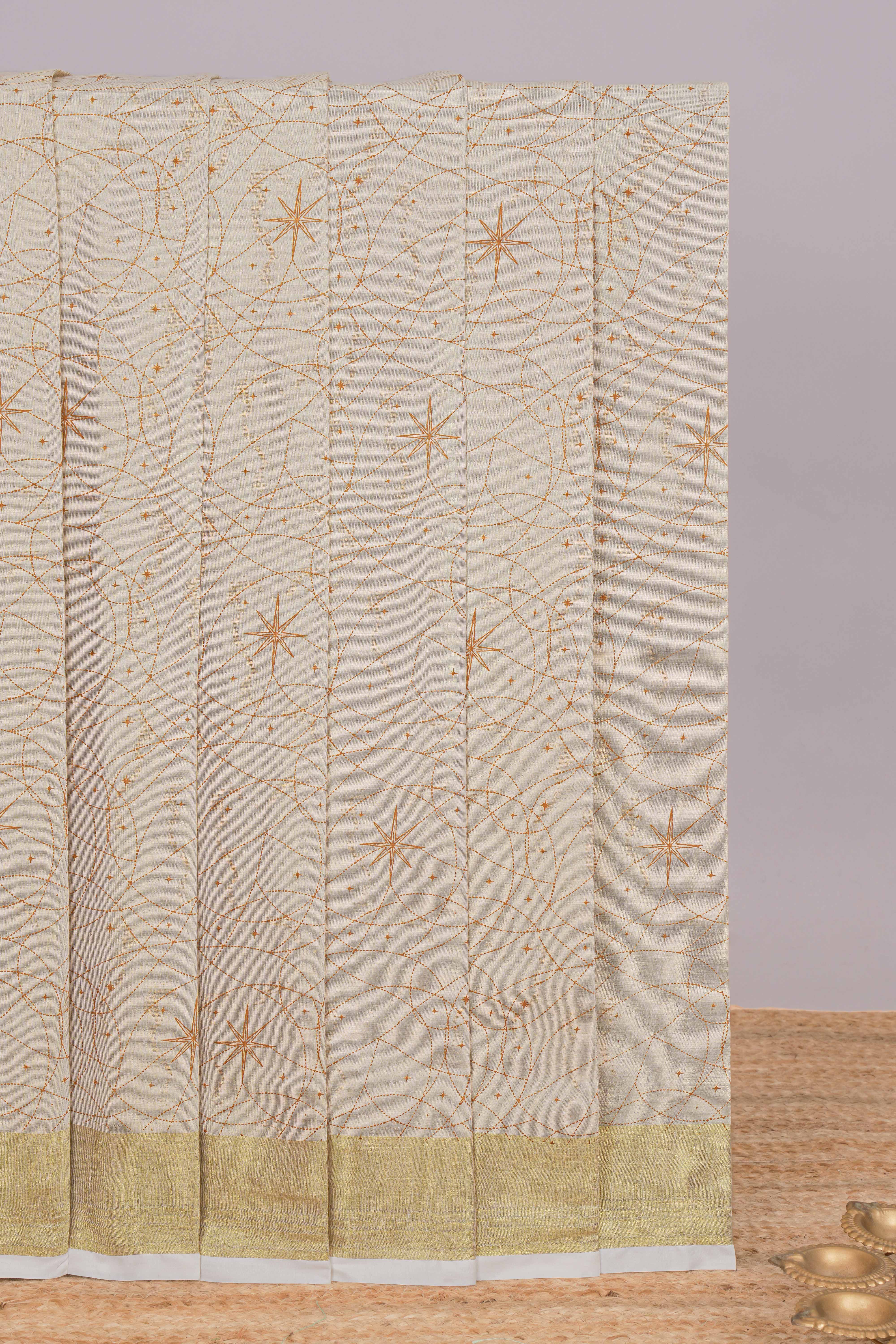Cream unique design kerala cotton saree with self zari border and matching blouse