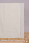 Cream plain design kerala cotton saree with self zari border and matching blouse
