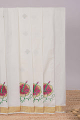 Cream floral design kerala cotton saree with self zari border and matching blouse