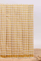 Cream golden zari checked design kerala cotton saree with self zari border and matching blouse