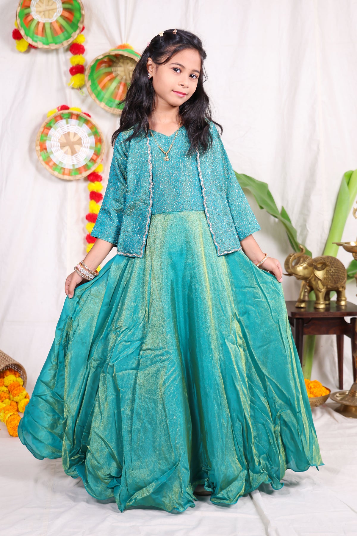 Girls Teal Green Foil Print Indo Western Lehenga Gown with Matching Embroidered Shrug Jacket