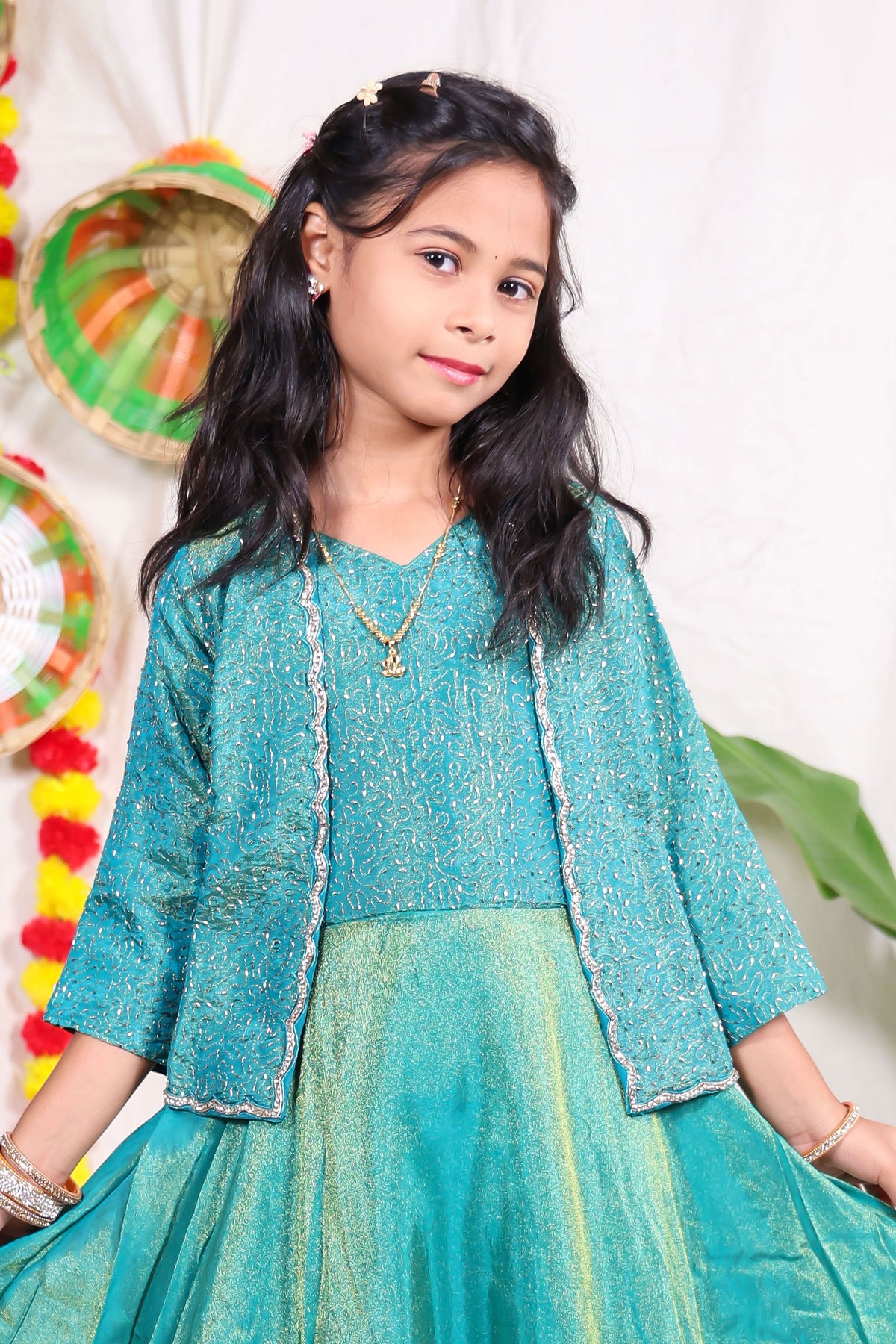 Girls Teal Green Foil Print Indo Western Lehenga Gown with Matching Embroidered Shrug Jacket