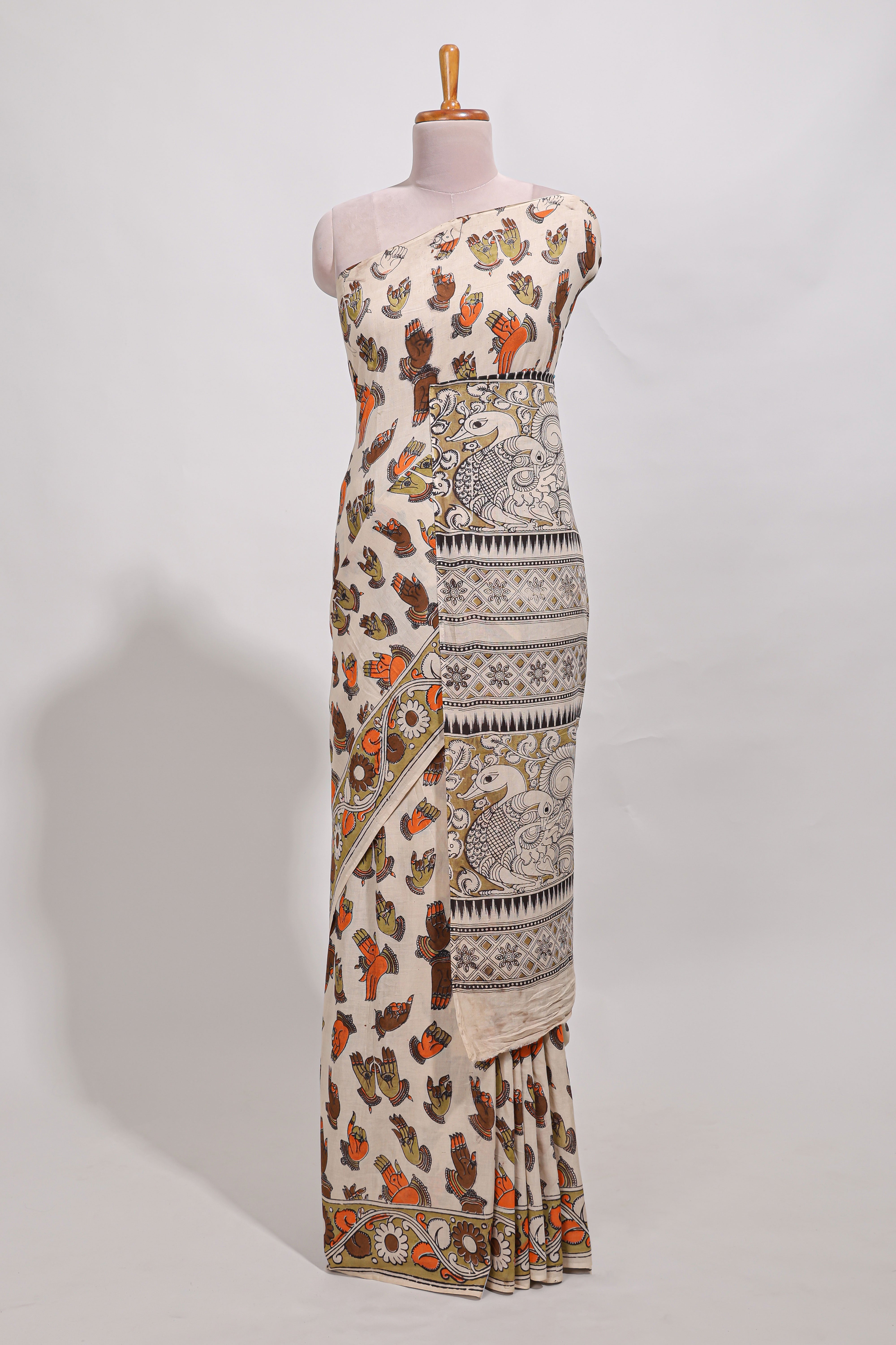 Multicolour kalamkari printed cotton saree with traditional floral motifs and contrast pallu