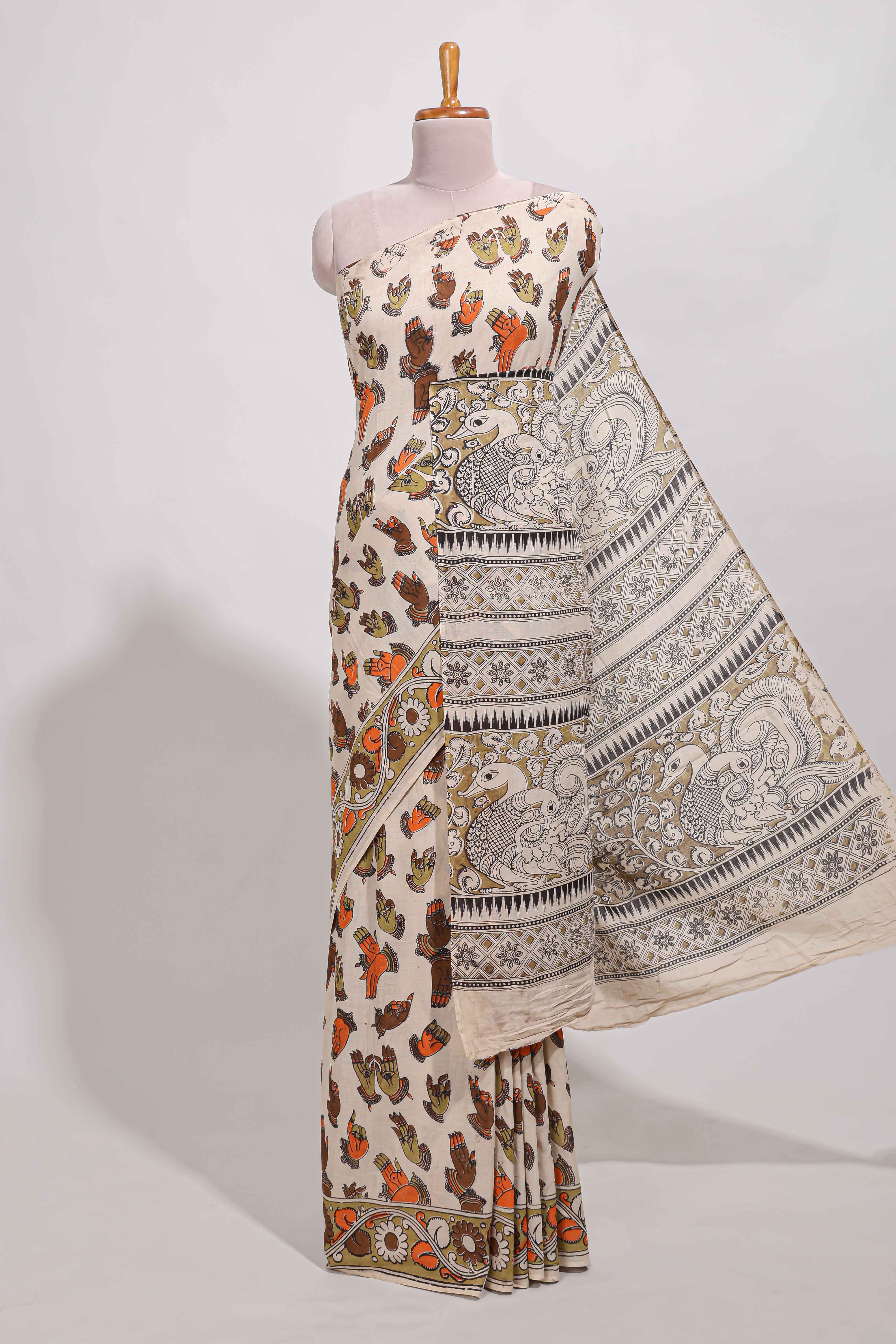 Multicolour kalamkari printed cotton saree with traditional floral motifs and contrast pallu