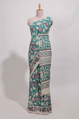 Green kalamkari printed cotton saree with traditional floral motifs and contrast pallu
