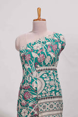 Green kalamkari printed cotton saree with traditional floral motifs and contrast pallu