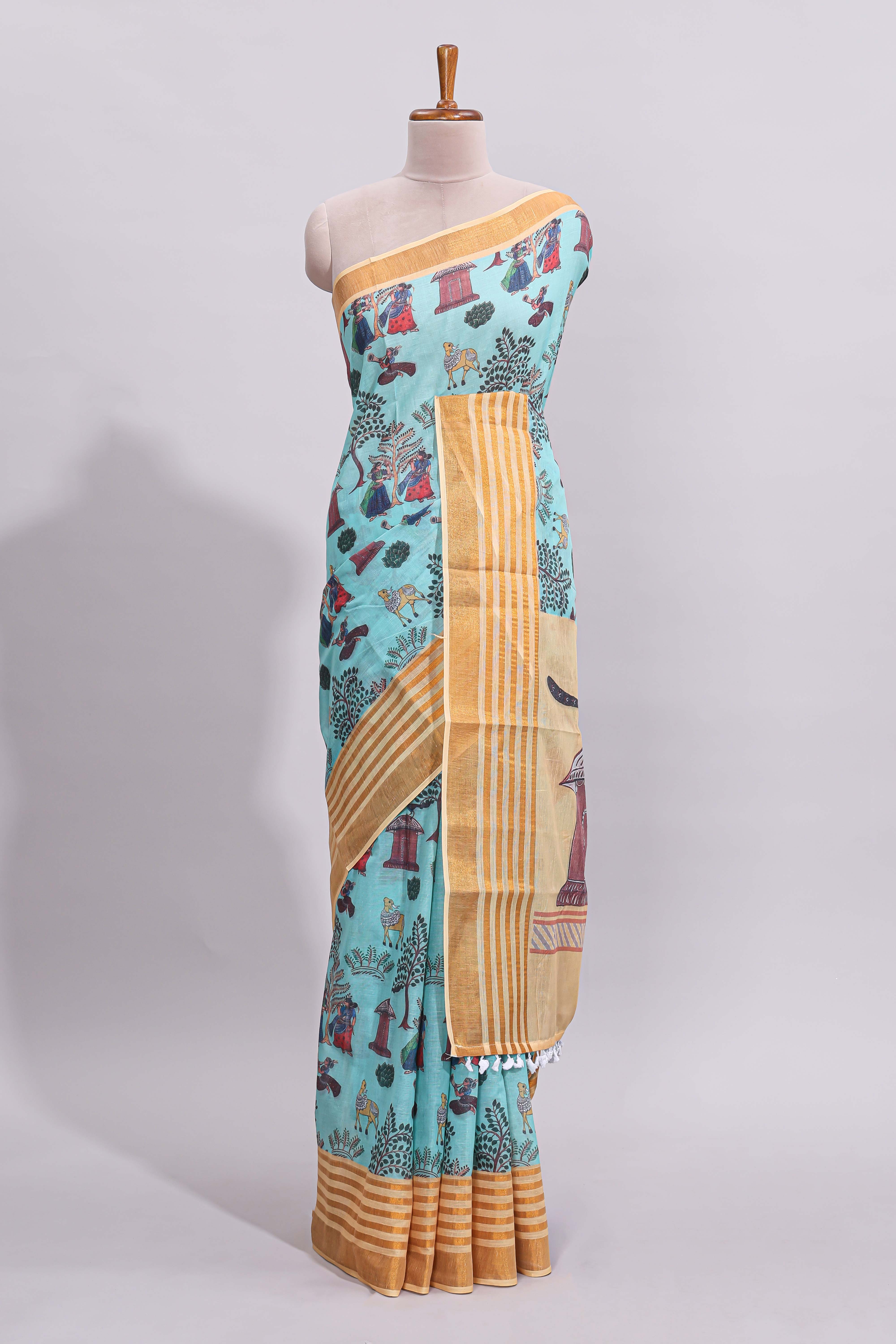 Blue traditional motifs kalamkari cotton saree with contrast zari border and motifs blouse