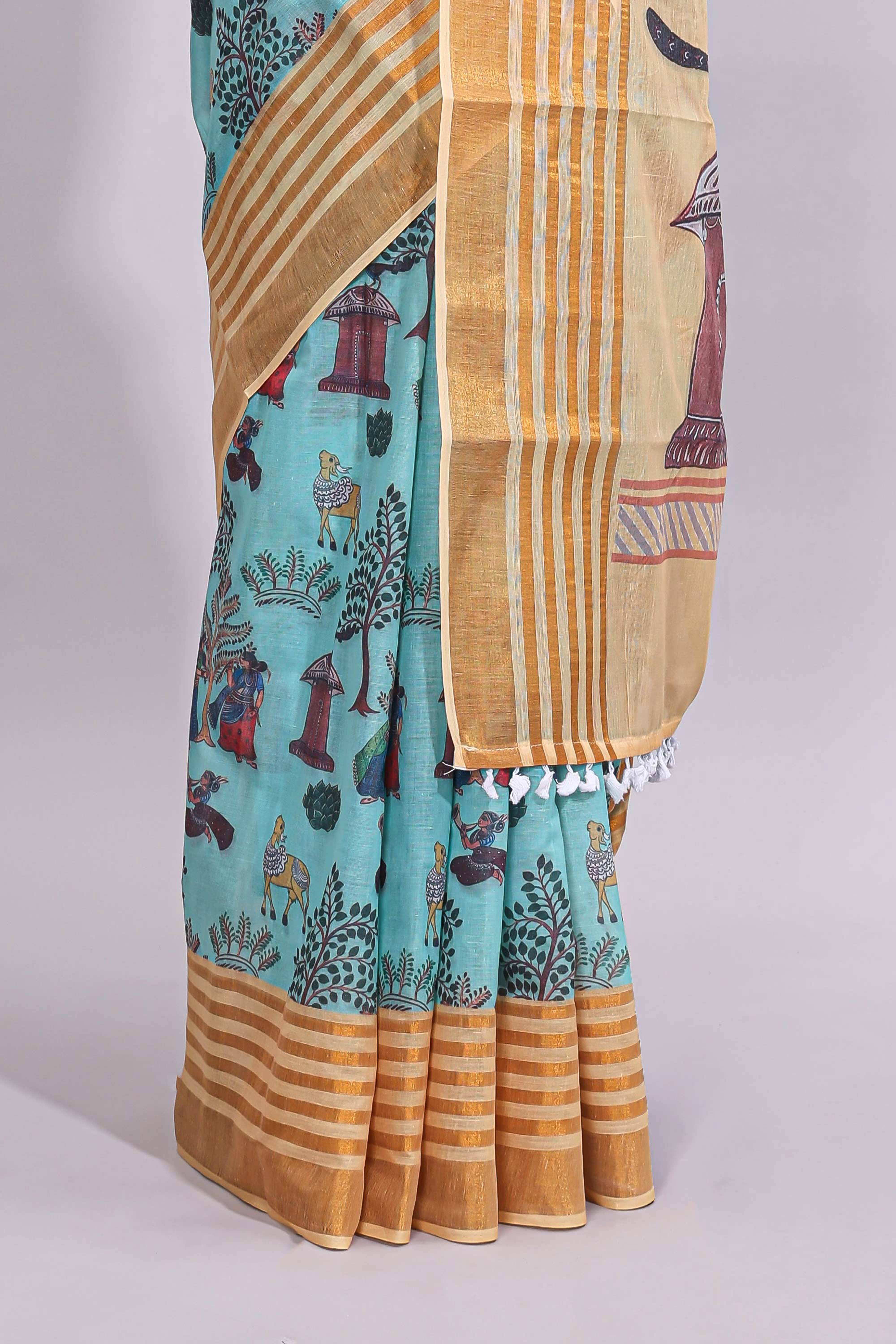 Blue traditional motifs kalamkari cotton saree with contrast zari border and motifs blouse