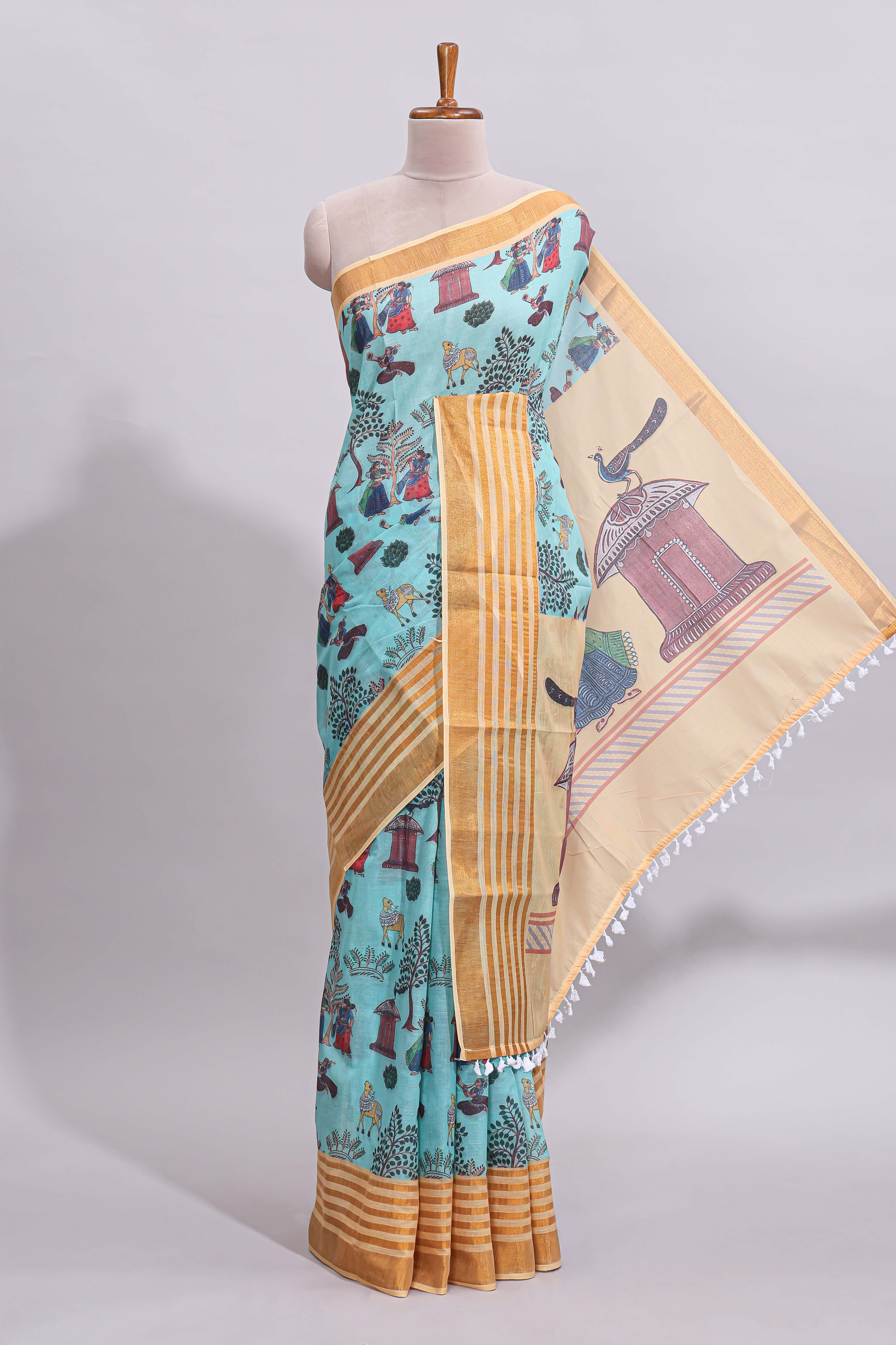 Blue traditional motifs kalamkari cotton saree with contrast zari border and motifs blouse