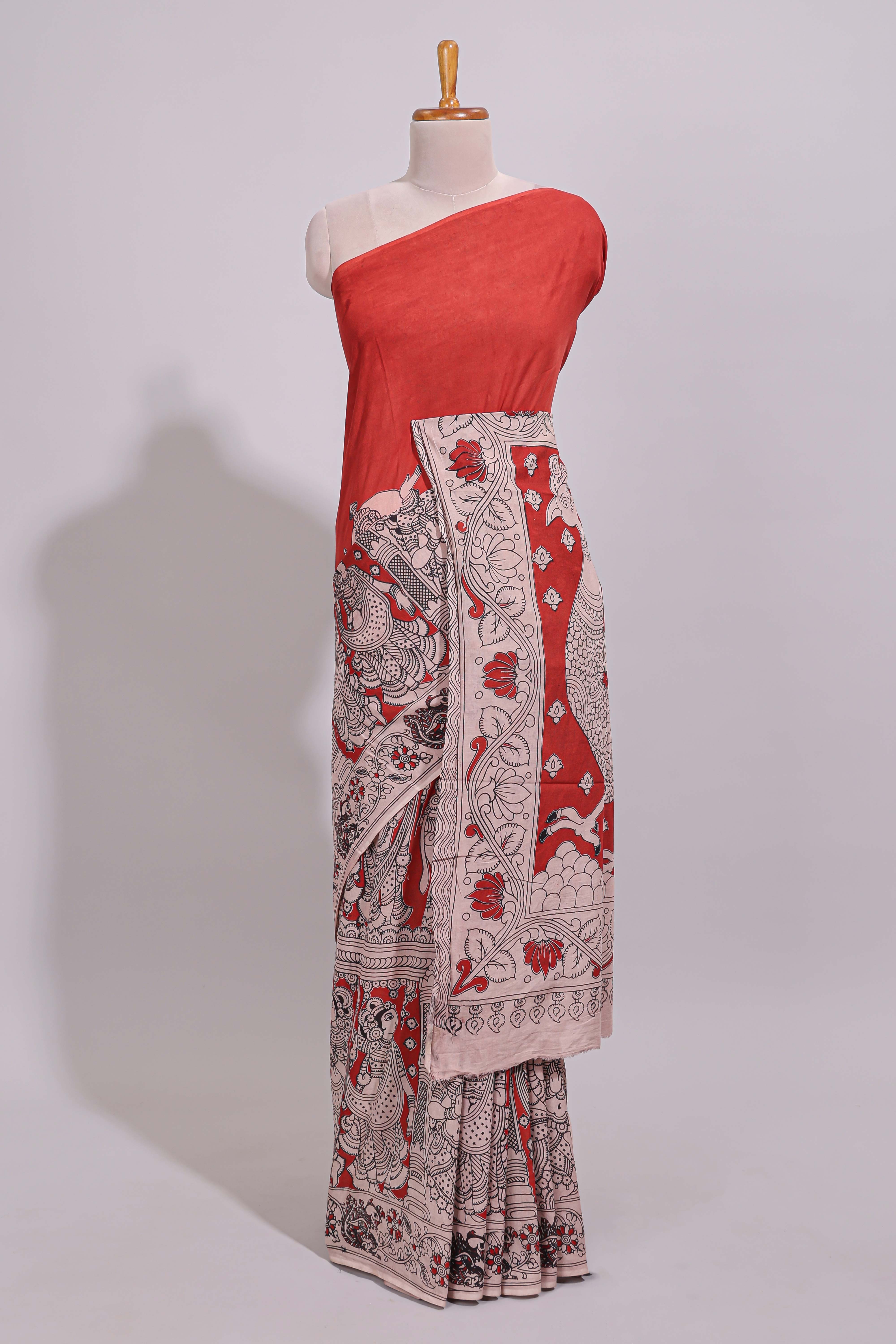 Red hand painted peacock & floral design kalamkari cotton saree with contrast border and floral printed blouse