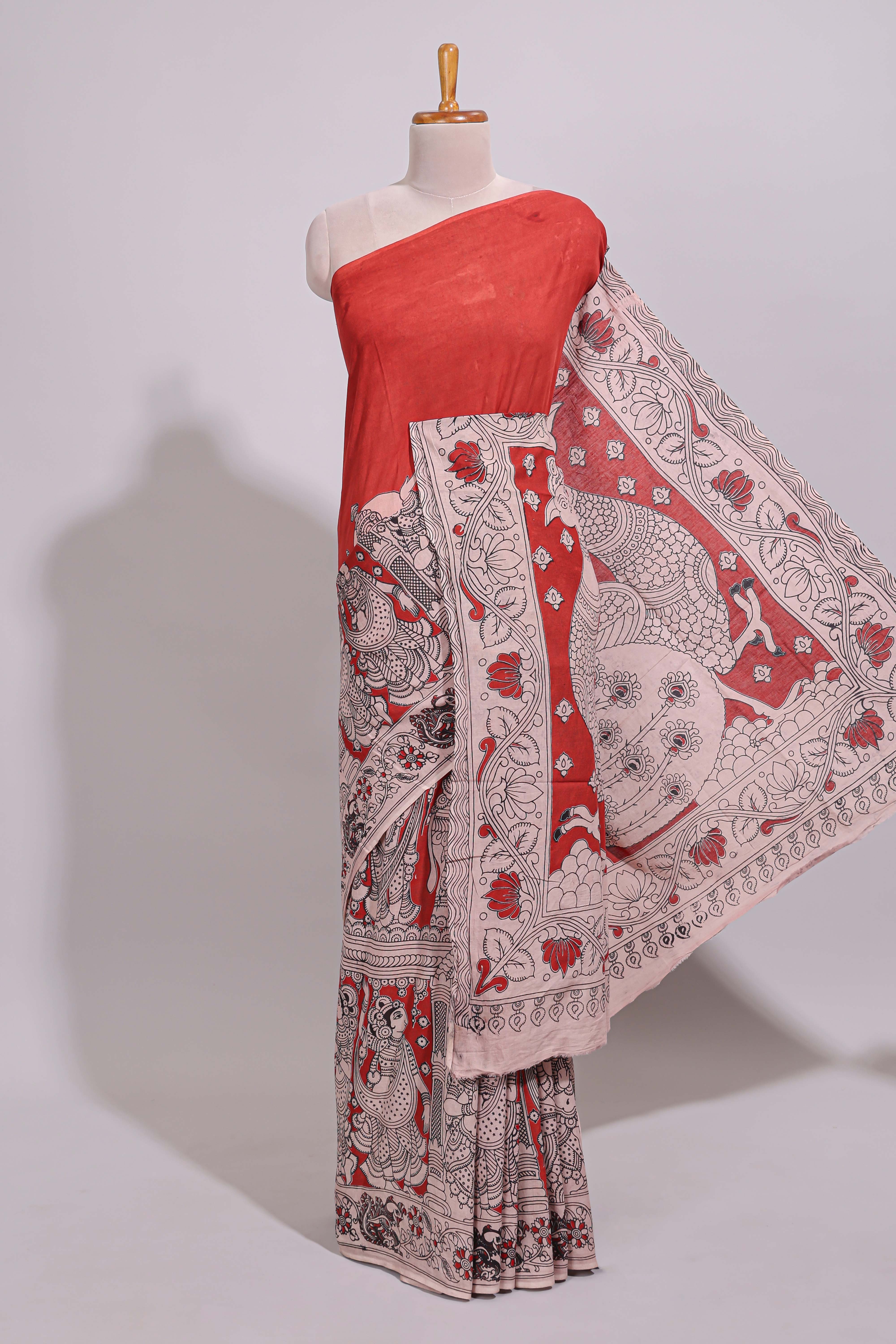 Red hand painted peacock & floral design kalamkari cotton saree with contrast border and floral printed blouse