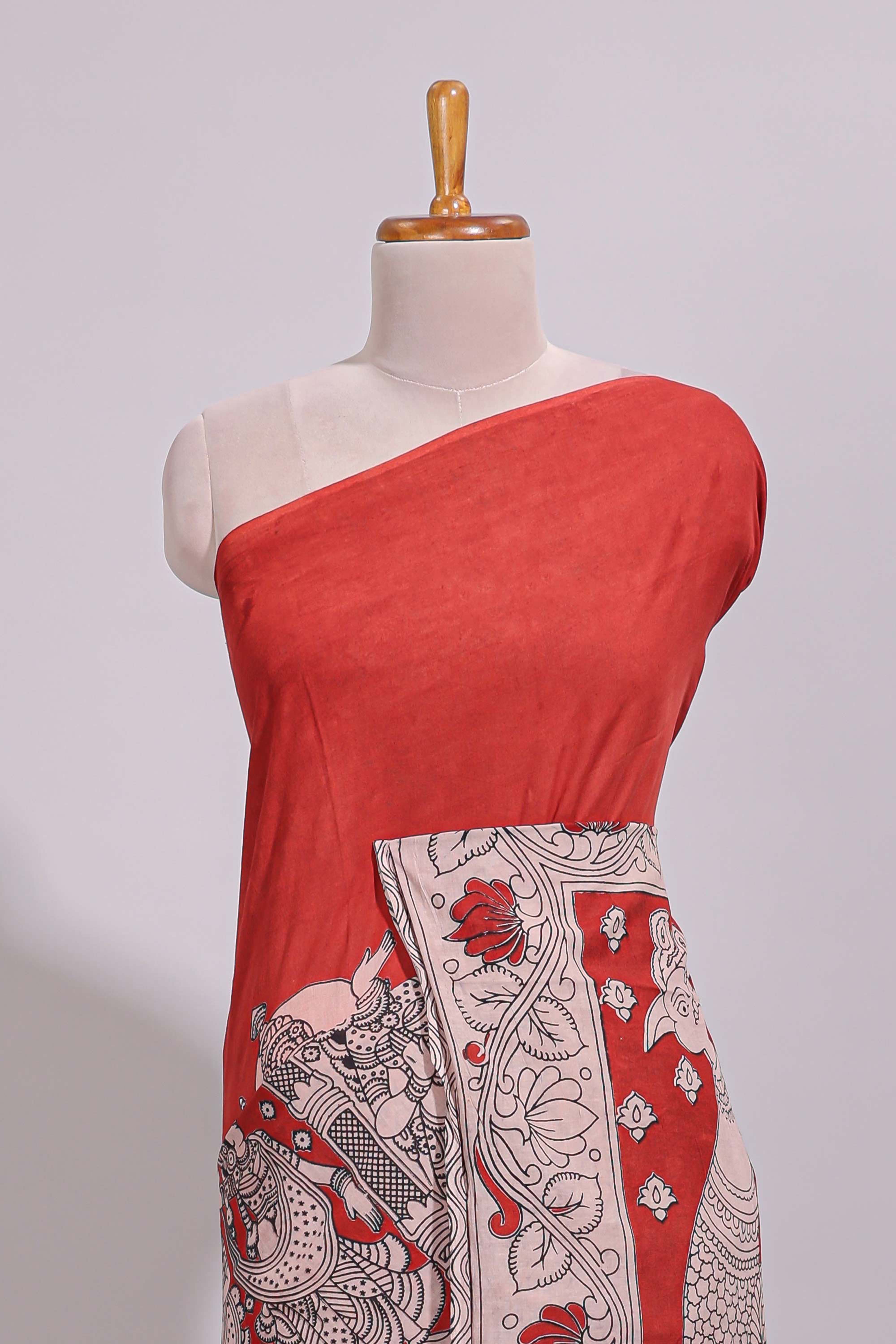 Red hand painted peacock & floral design kalamkari cotton saree with contrast border and floral printed blouse