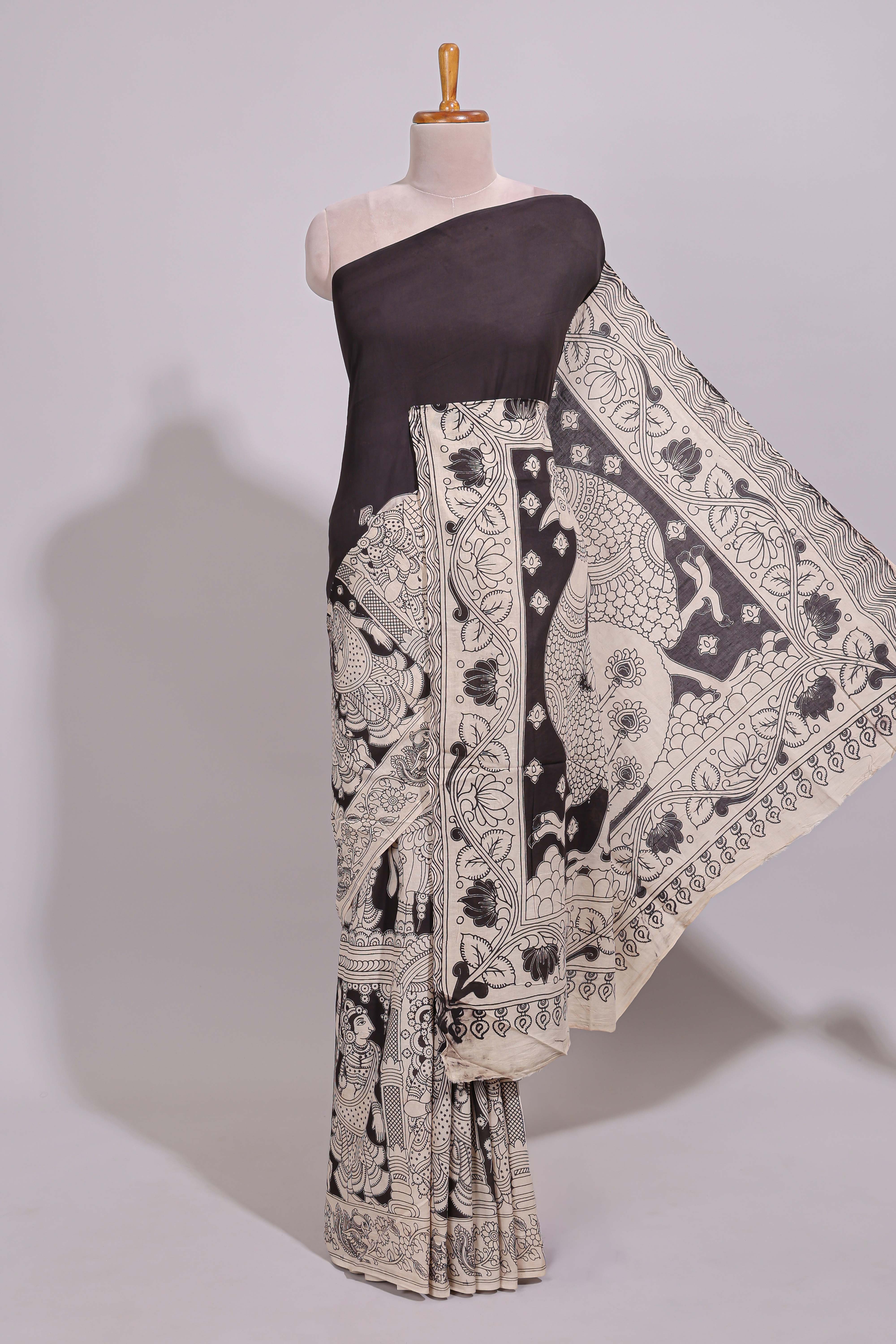 Black hand painted peacock & floral design kalamkari cotton saree with contrast border and floral printed blouse