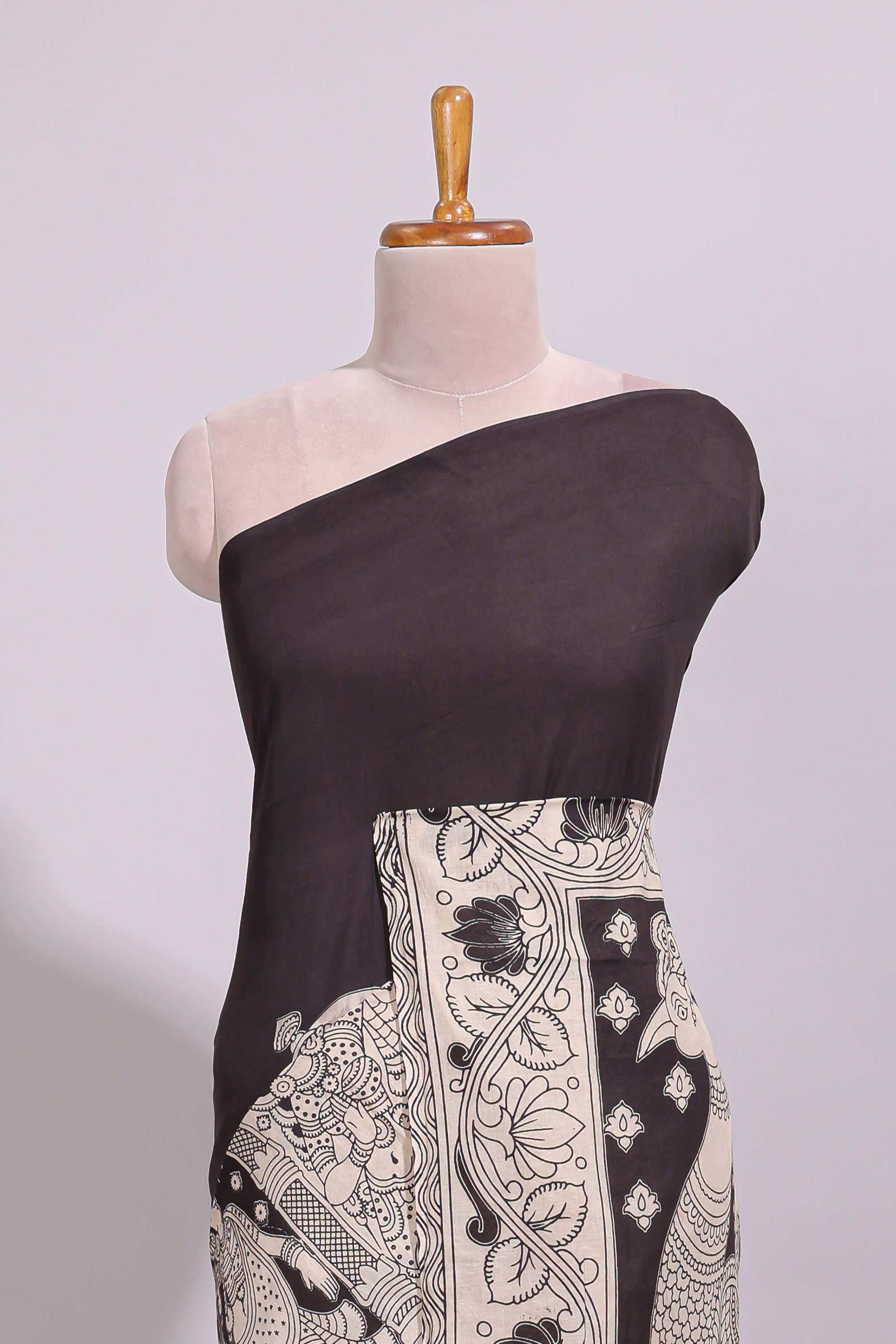 Black hand painted peacock & floral design kalamkari cotton saree with contrast border and floral printed blouse